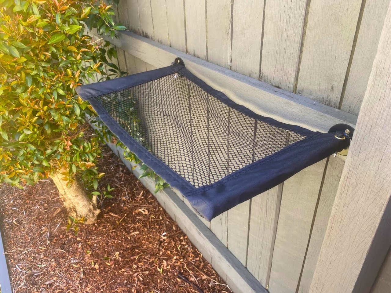 Outdoor Cat Hammock on fence