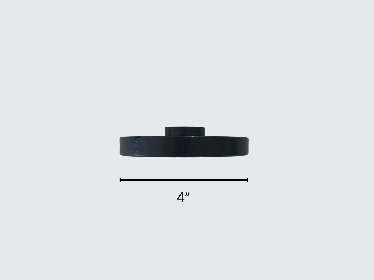 Black circular object with a measurement label on a white background