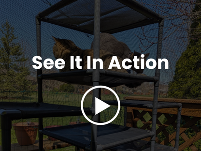 Video of Black PVC Cat Tower in a patio with cat lounging